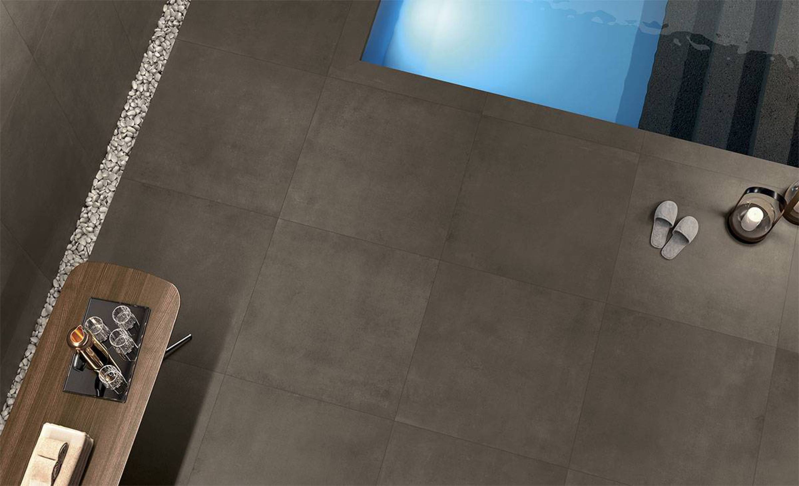 Bovenaanzicht met zwembad infinity betonlook